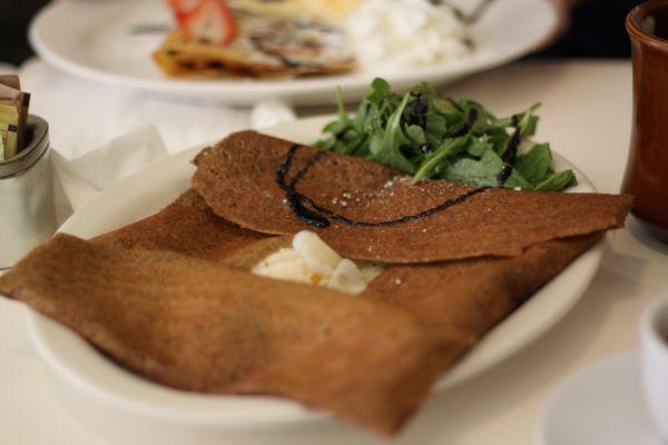 Buckwheat crepe with greens, avocado, egg, and goat cheese - great flavor, large quantity