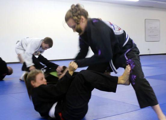 Women enjoy many benefits of training Jiu Jitsu including developing high levels of self defense and fitness!