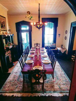 Large formal dining table holds 12 comfortably.