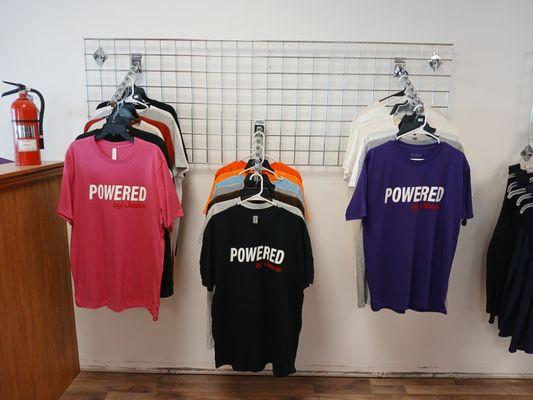 POWERED BY JESUS shirts