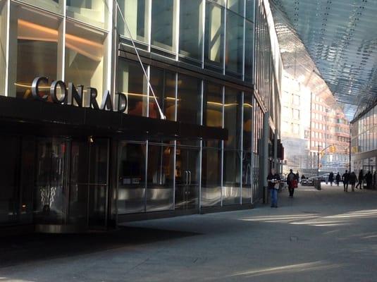 Entrance to the Conrad Hotel in Goldman Alley. We're located on the atrium level, down the hall from the fitness center.