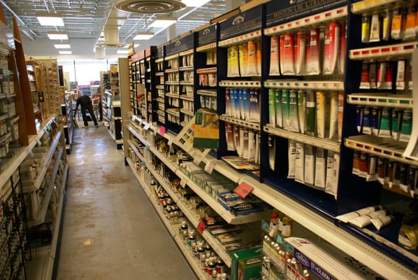 Aisles of artist paints.