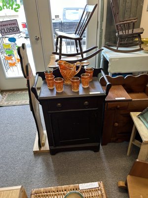 Set of carnival glass pitcher and glasses