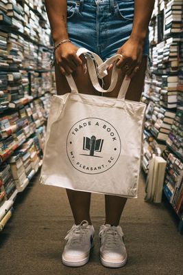 TAB has these adorable totes to carry all of your bookish needs!