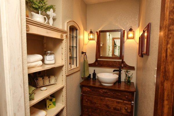 First bathroom with jet tub and shower.