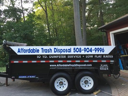 10yd. Rubber wheeled dumpster service perfect for trash disposal , junk removal . Westborough ,Ma.