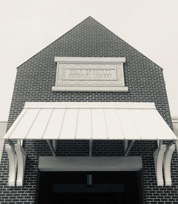 Entrance to Nola Brantley Library is in back, where parking lot is