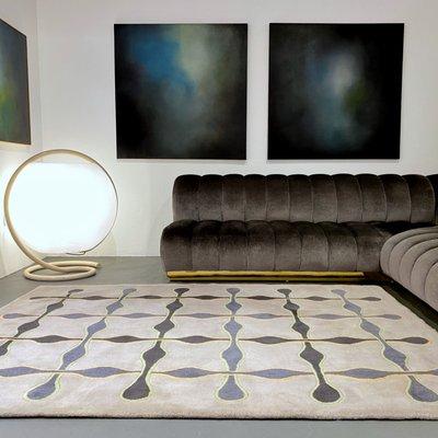 Steve Chase Sofa, Karim Rashid Rug, Elio Martinelli Lamp, Paintings by Robin Harker