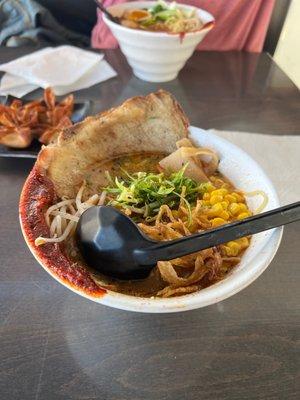 Spicy miso.spicy ramen in background..