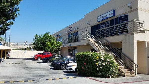 The entrance, can be accessed from stairs, or a bridge from the second level of the parking structure.