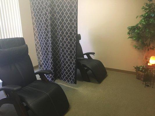 Post-adjustment recovery suite with HumanTouch zero gravity chairs.