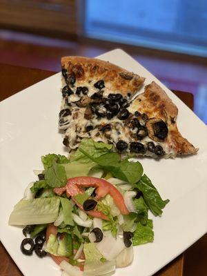 Mushroom and olives pizza with garden salad