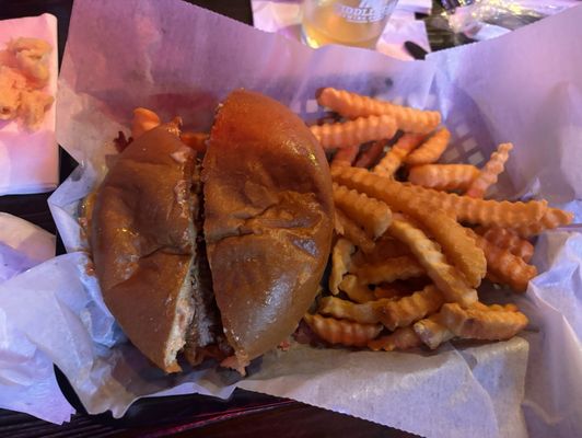 Bacon cheeseburger cooked perfectly and fries piping hot.