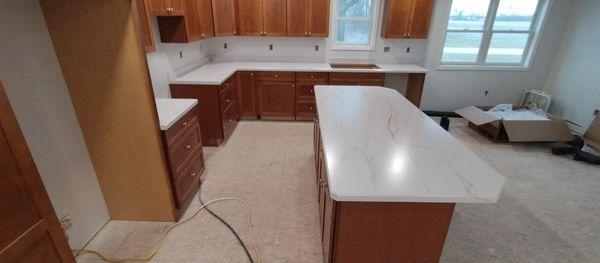 New construction laminate countertops ready for plumbing and appliances.