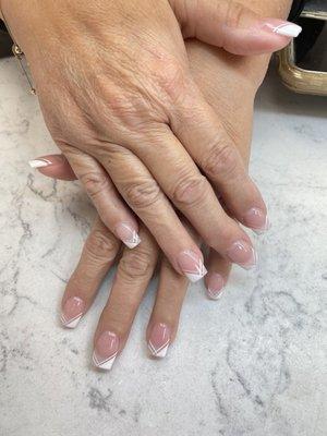 New set with French tips with line.