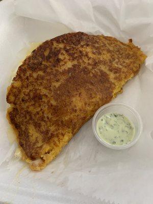 Cachapa. Our version has sweet plantains and Gouda cheese