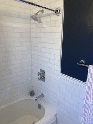 After photo - newly installed tile, tub and hardware