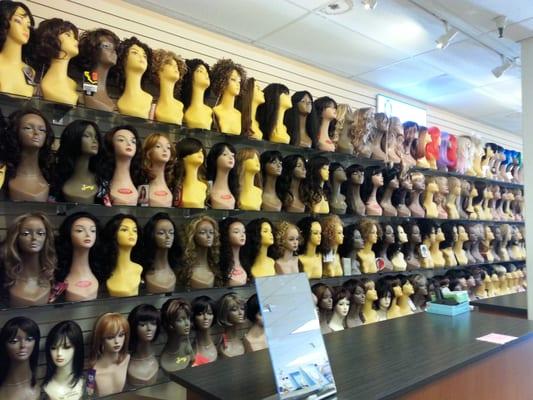 Wide selection of human and synthetic wigs and hair extensions.