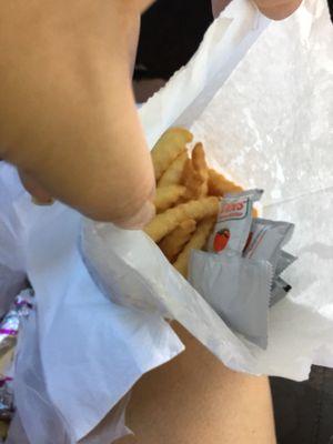 Crinkly fries come in a medium size white bag!! Nice portions