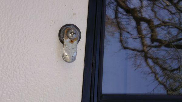 Condensation has made the hatch door turns impossible to use with bare hands.