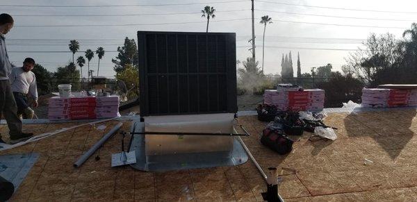 Package unit on unfinished roof. (New construction)