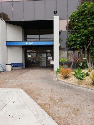 The front entrance. The laboratory is on the first level on the right wing of this building.