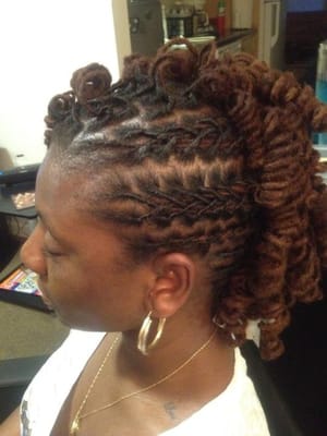 excellent maintenance, hot color, fabulous curls pinned up in a mohawk