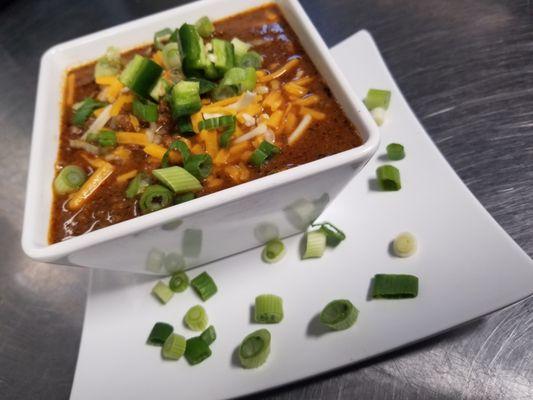 Nothing like a bowl of chili on a cold evening! Have yours on a bed of fluffy potatoes for dinner!