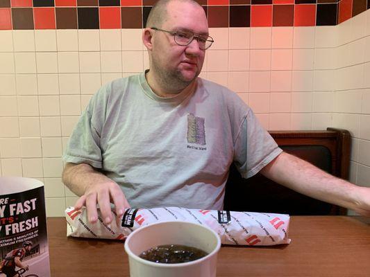 My hubby with his big sandwich from Jimmy Johns.