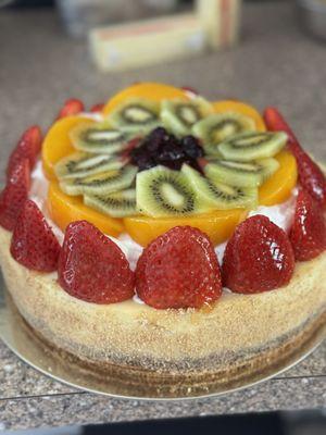 Plain Cheesecake Topped w/ Fresh Fruit & Whipped Cream