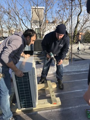 Minisplit installation On the roof Minisplit condenser unit