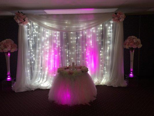 beautifully lit curtain light that can extend up to 20 feet! Featuring pretty pink lighting and pink and white, silk roses.