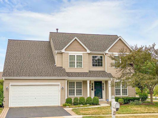 Legendary Transformation with new roof and siding.  Added some shakes in the gables, nice custom touch to this house.