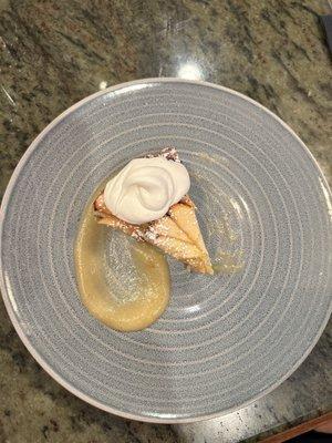 Italian apple cake with a tart Rubinette apple compote, pine nuts, and Chantilly whipped cream.