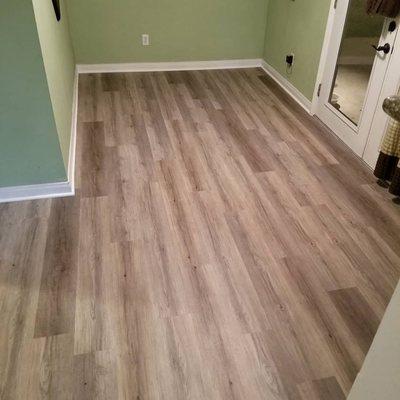 Luxury vinyl plank/w New baseboards