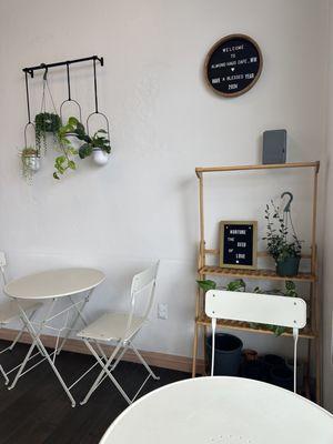 Low key seating areas with life's simple pleasures, coffee and plants!