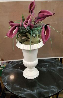 Vase with artificial flowers