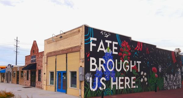 Along Came Tamale ( mustard color front ) in downtown Fate, Texas.