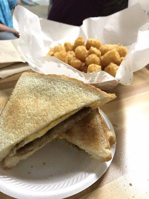 Breakfast sandwich and TOTS!!!  Tots are great.  Check them out if you feel like .