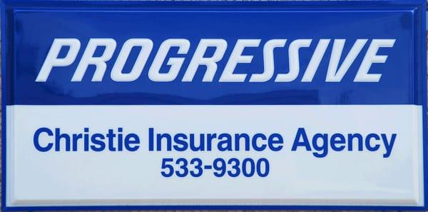 Progressive Sign on Building