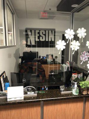 Check in at NESIN Physical Therapy.