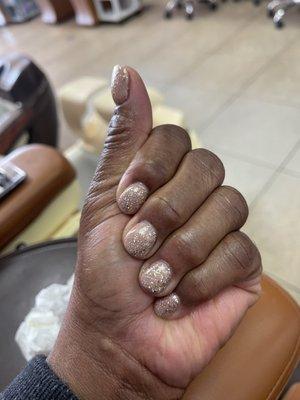 Manicure with gel polish glitter