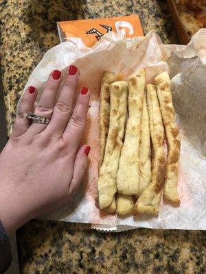 Our entire order of crazy bread is smaller than my hand.