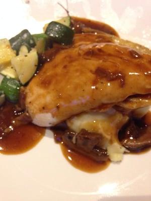 Chicken breast with mushroom sauce, over mashed potatoes and with mixed roasted vegetables