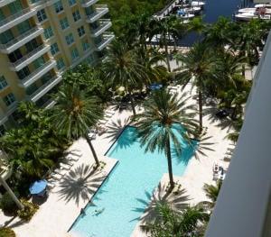 View of pool and marina at Marina Village Condos