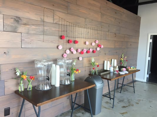 Coffee, tea, and water stations in the lobby for an event