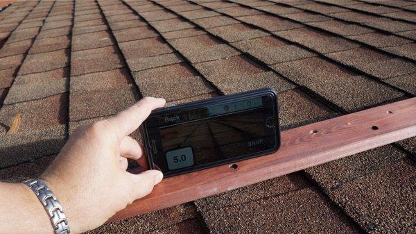 Measuring roof pitch