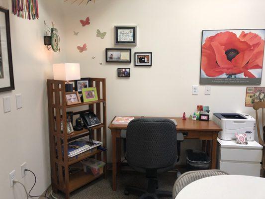 A "redefined" school office.  Room to work, with personality!