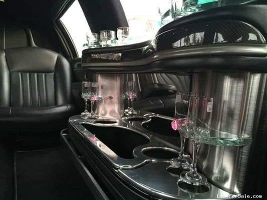 Black stretch 10 passenger Lincoln Limousine 5th door interior.