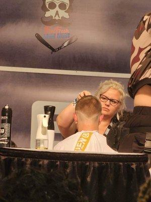 The boss, competing at the Connecticut Barber Expo in the lady Barber Battle, in front of 10k people.